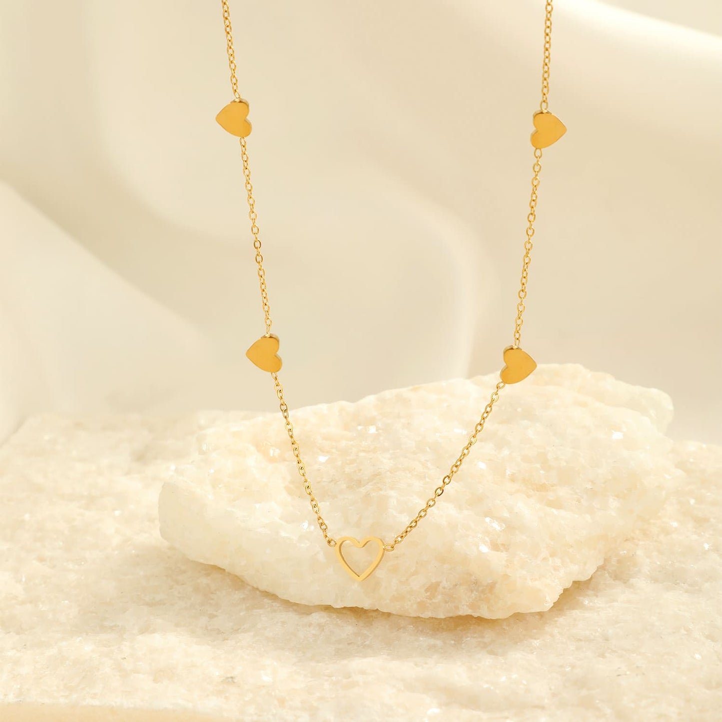 "VIER GESLOTEN HARTJES" GOUDEN KETTING