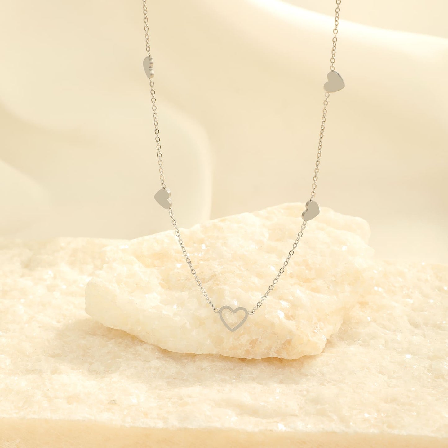 "VIER GESLOTEN HARTJES" ZILVEREN KETTING